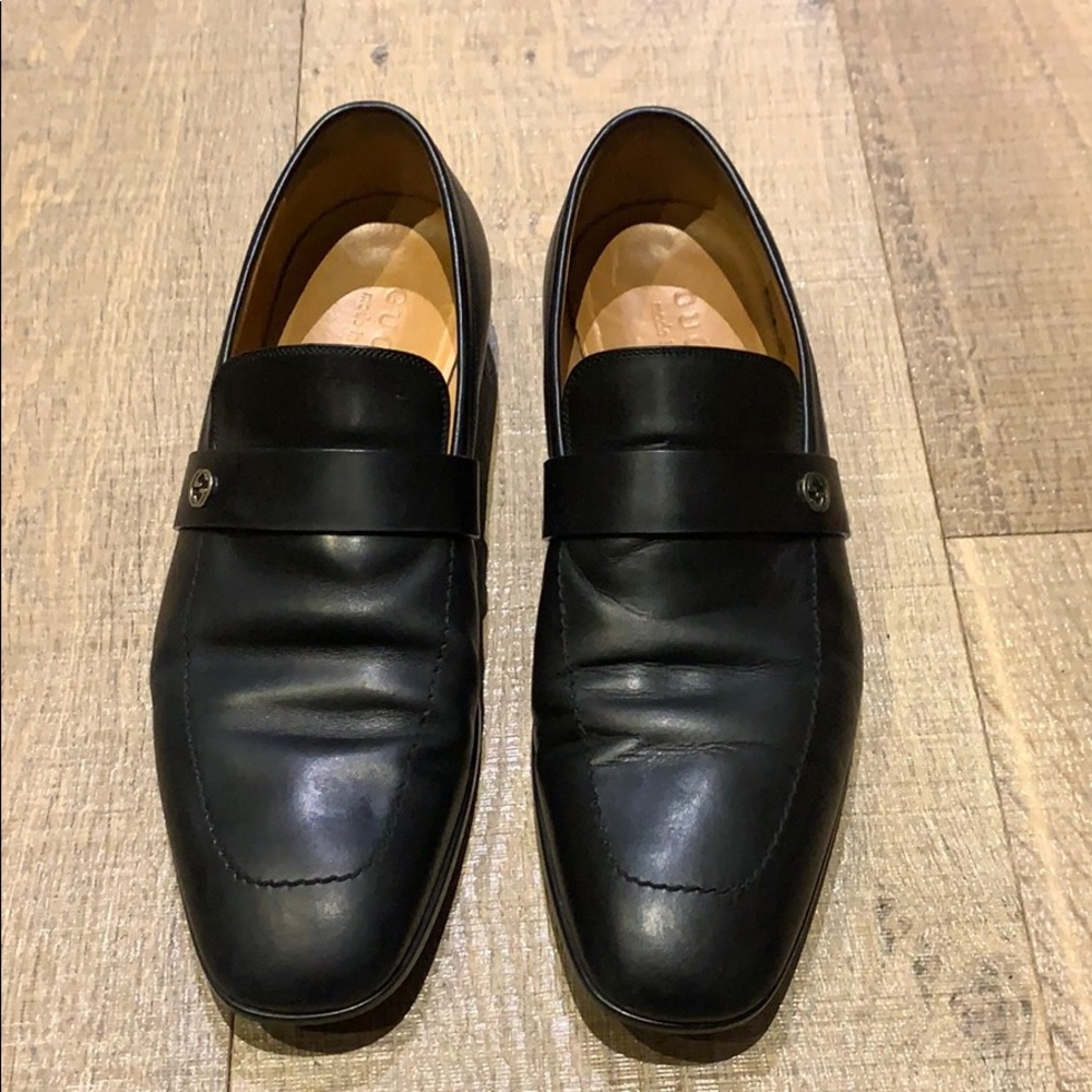 Men’s Gucci black leather slip on dress shoes